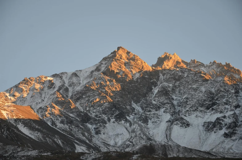 the snow covered mountains have very low lights