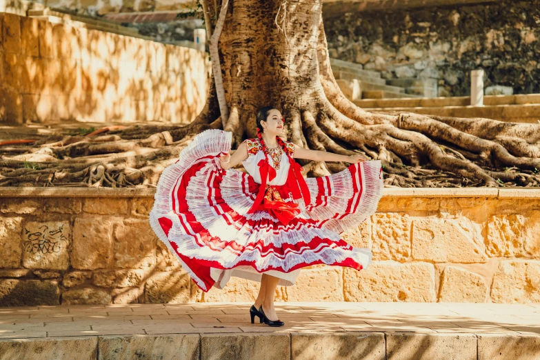 the woman is dressed in an indian style dress