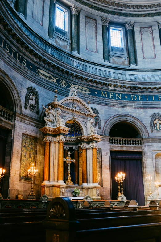 the inside of a cathedral has several large windows