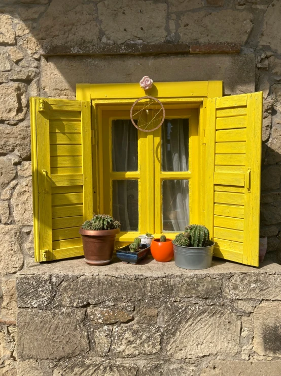 an image of window with yellow paint on it