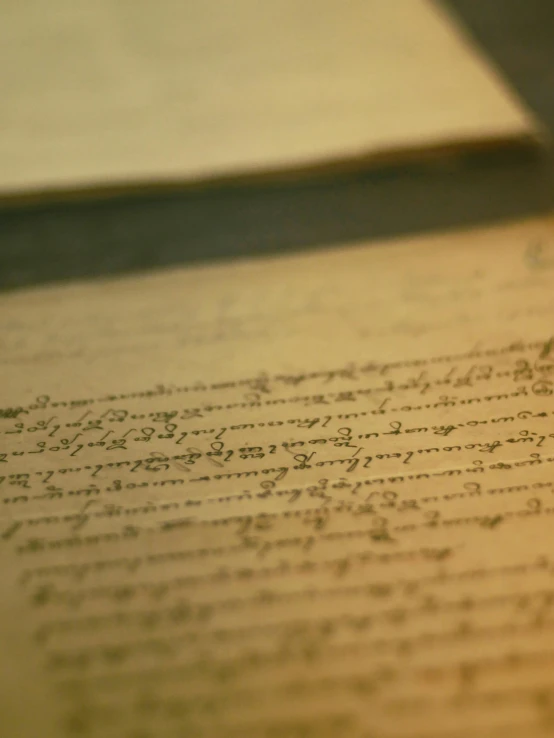 a close up view of a piece of paper with writing on it