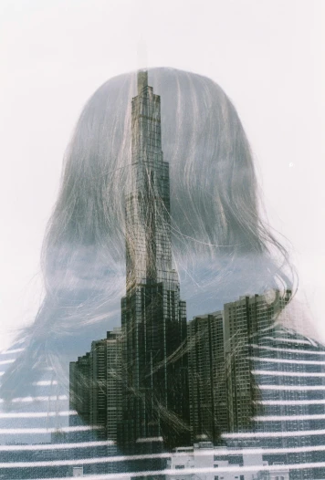 a double exposure po of a building in the city