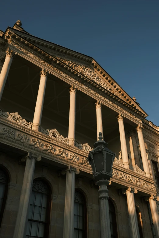 the sun is shining on an old building