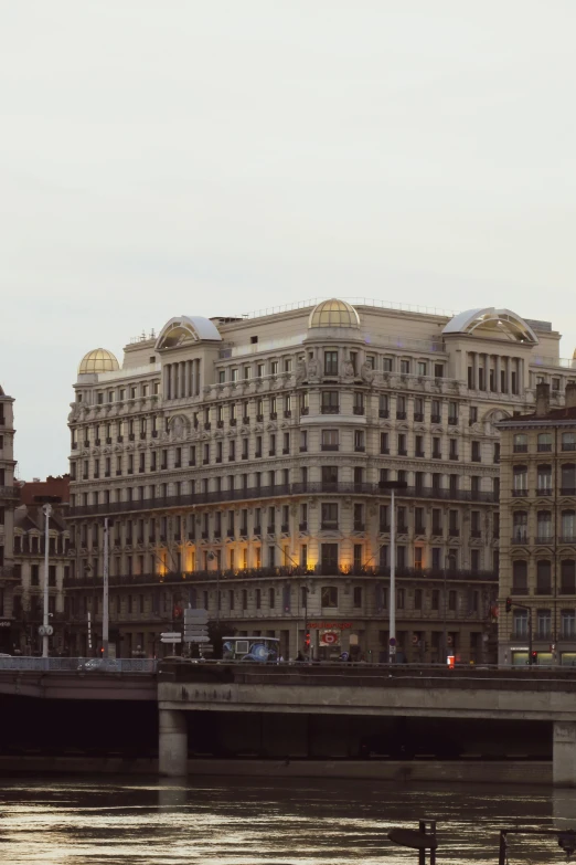 large building along the side of the water