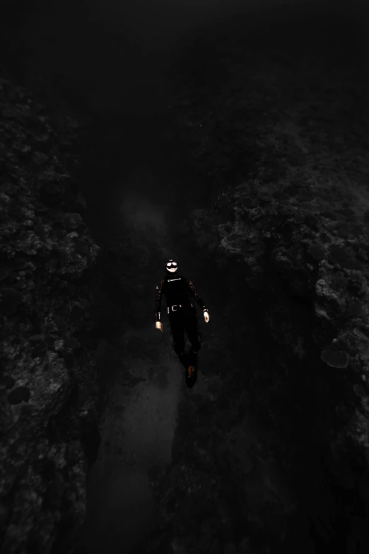 a man that is on a motorcycle in the dark