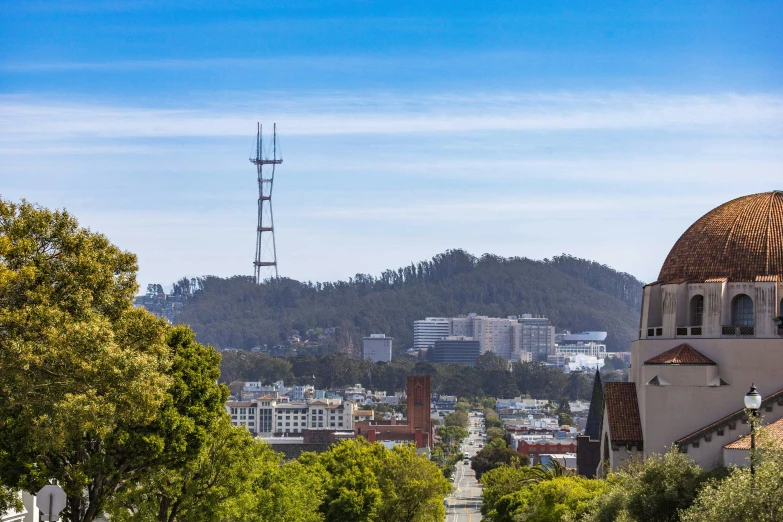 a scenic scene of a city and mountains