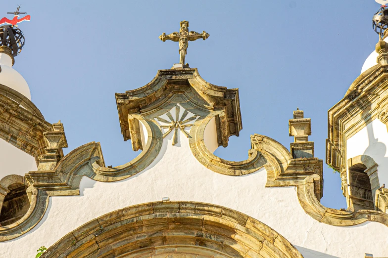 a church steeple, looking up at a clear sky