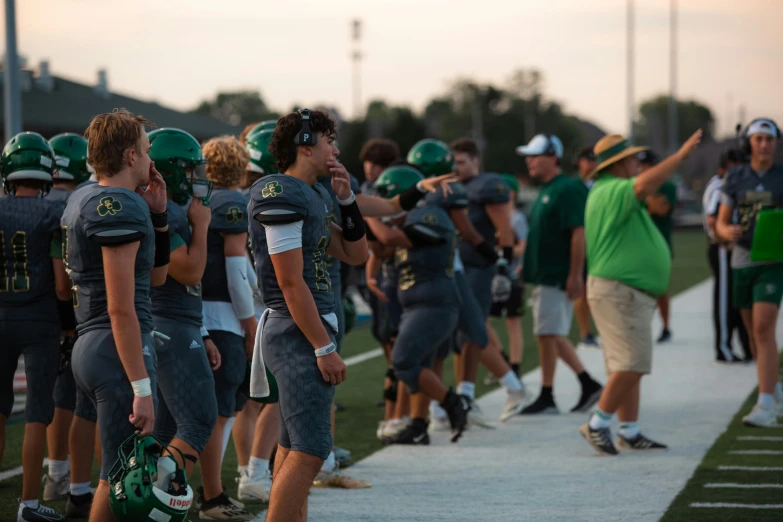 a football team is lined up for the next play