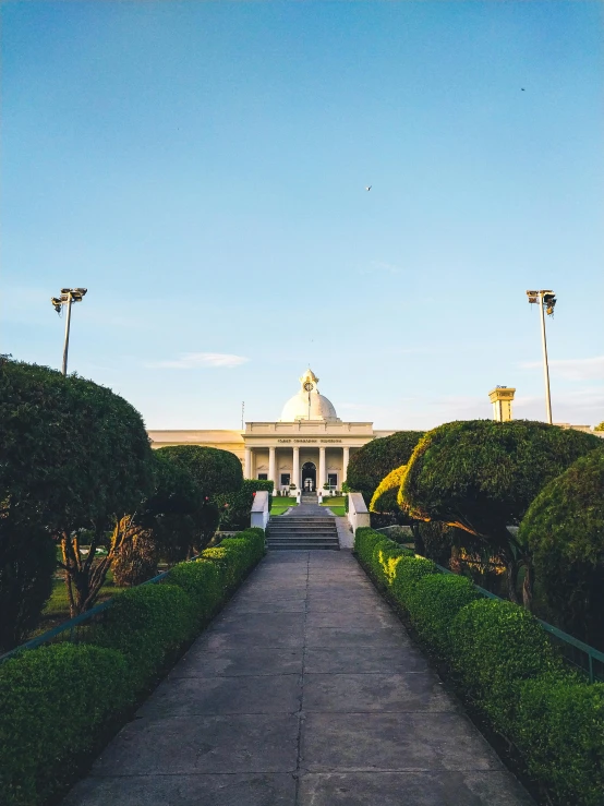 an intricate landscape in front of a building