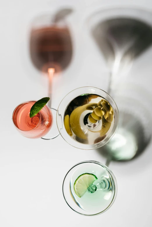 a couple of glasses sitting next to each other on top of a table