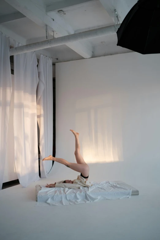 a person is doing soing in the air with one arm up