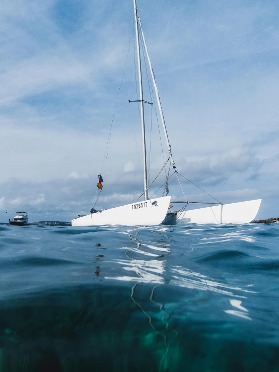 the white sailboat is out in the water