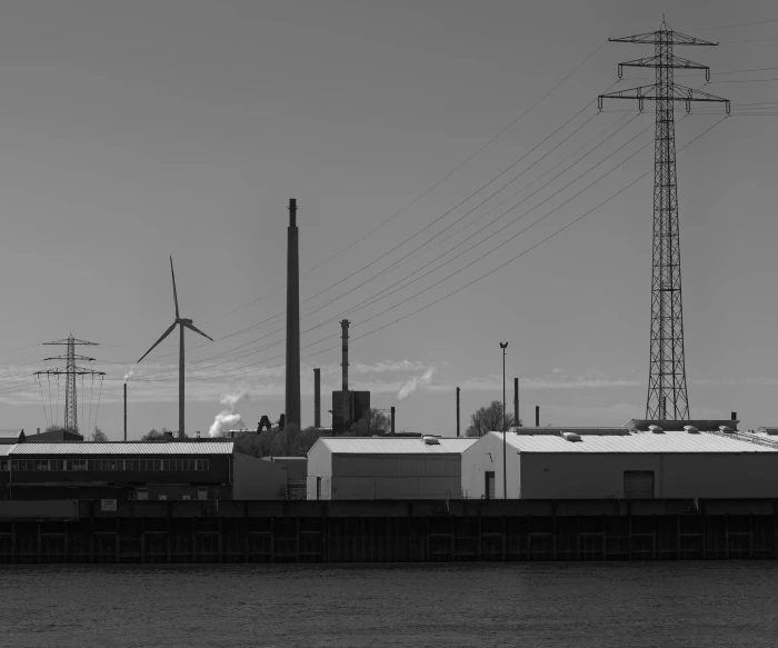 industrial power lines with power poles in the distance