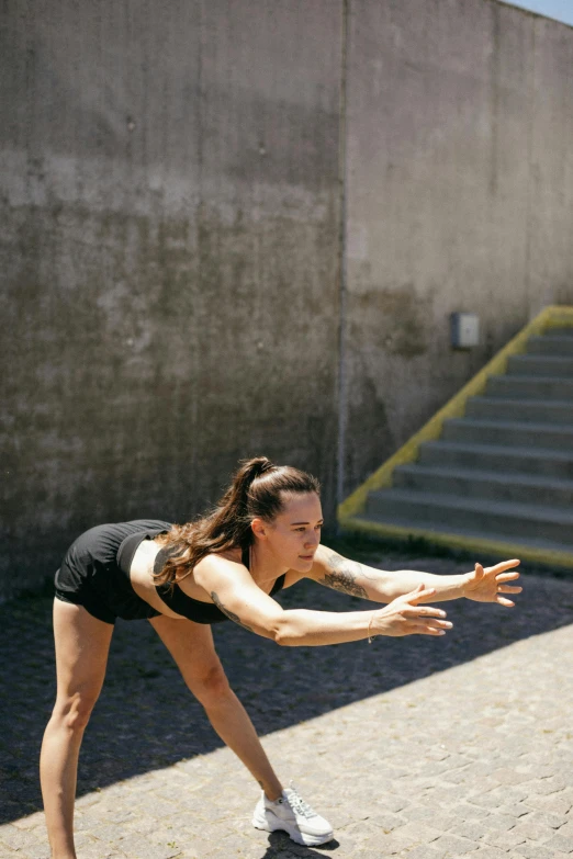 a person standing on a skateboard doing a trick