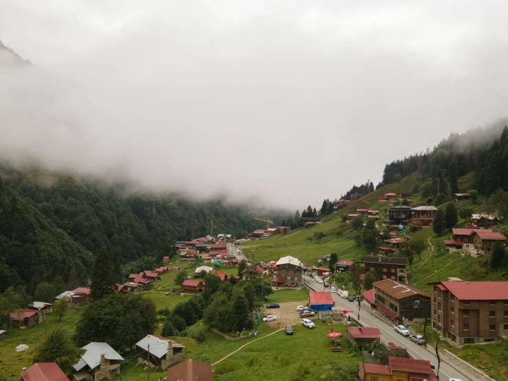 a town with buildings sits on the mountain side