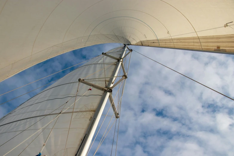 an overview view of a sail boat that is sailing