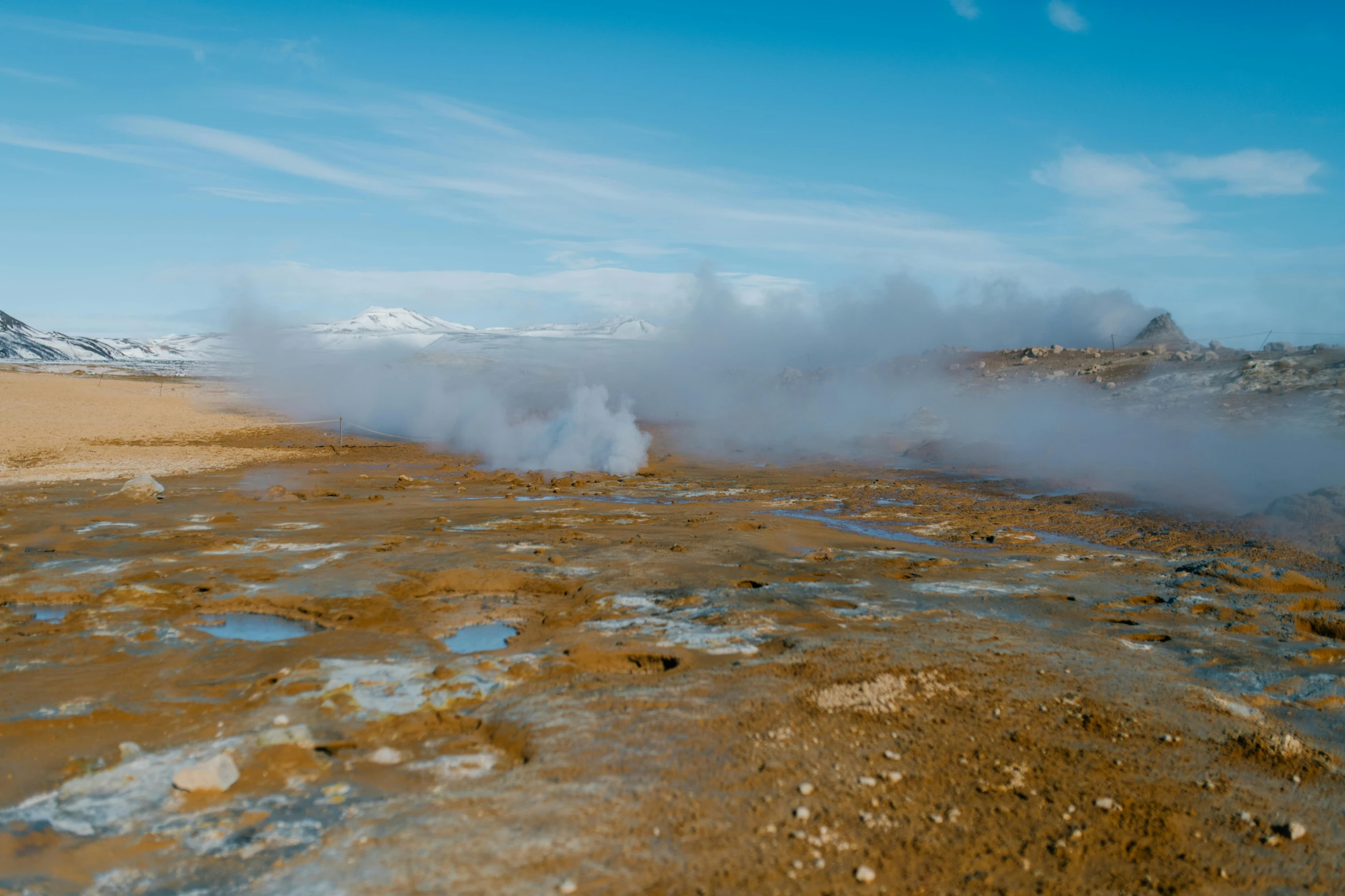 a view of smoke coming out from the ground