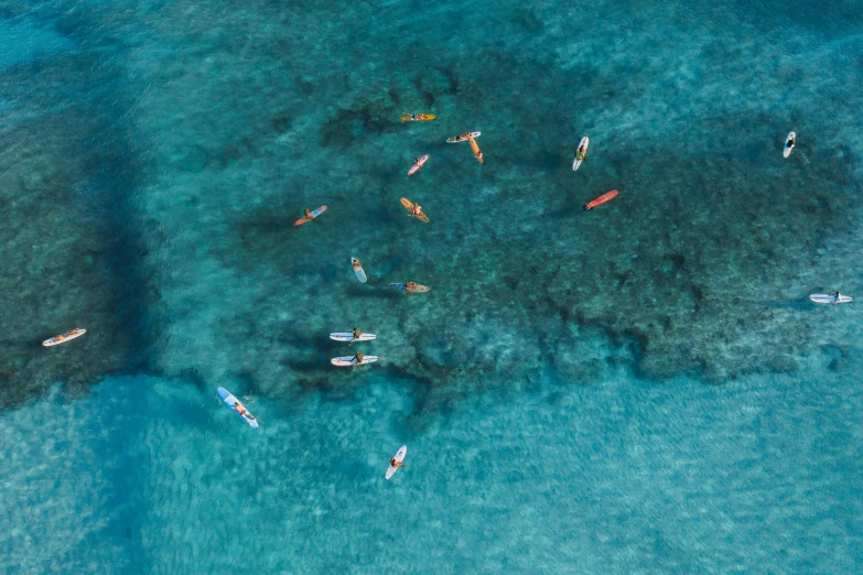 there are many kayaks floating in the water