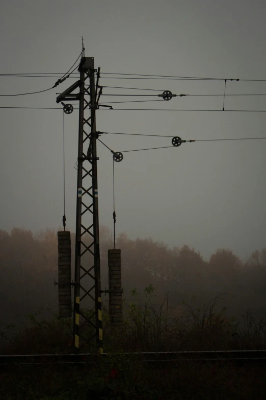 two power poles in the distance against a hazy sky