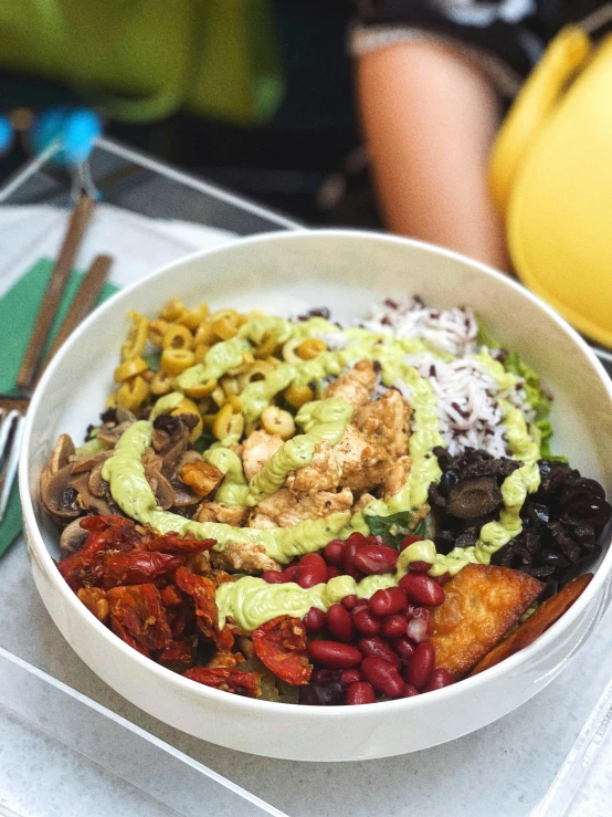 a close up of a bowl of food on a table