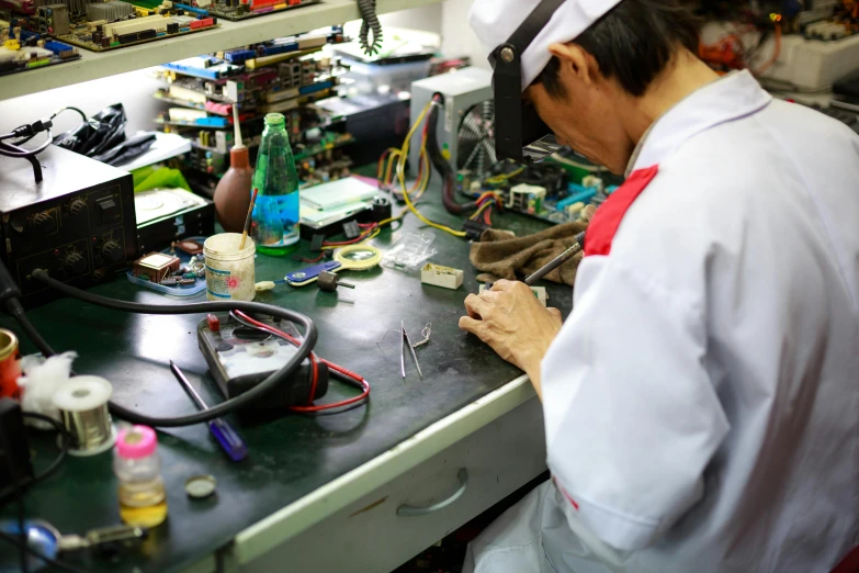 an engineer working with many different types of electronic devices