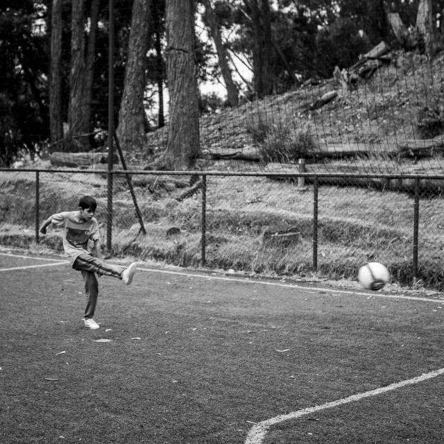 a  playing on a tennis court