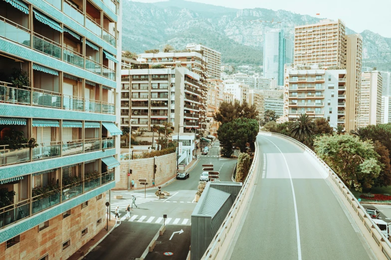 an empty street with lots of vehicles driving