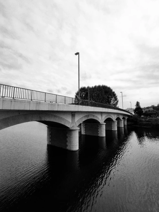 an overpass is shown in black and white