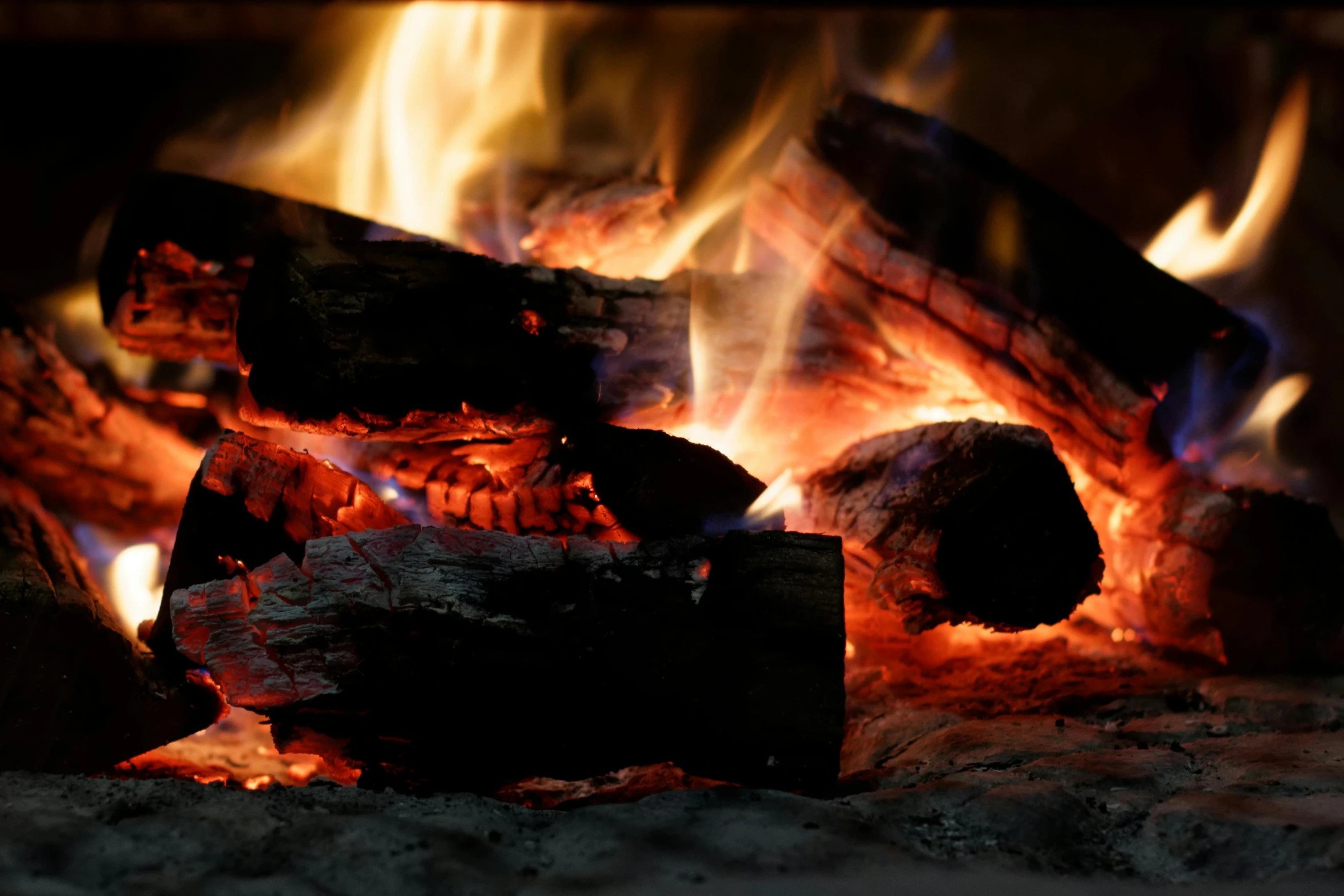 a close up of a fire in a fireplace