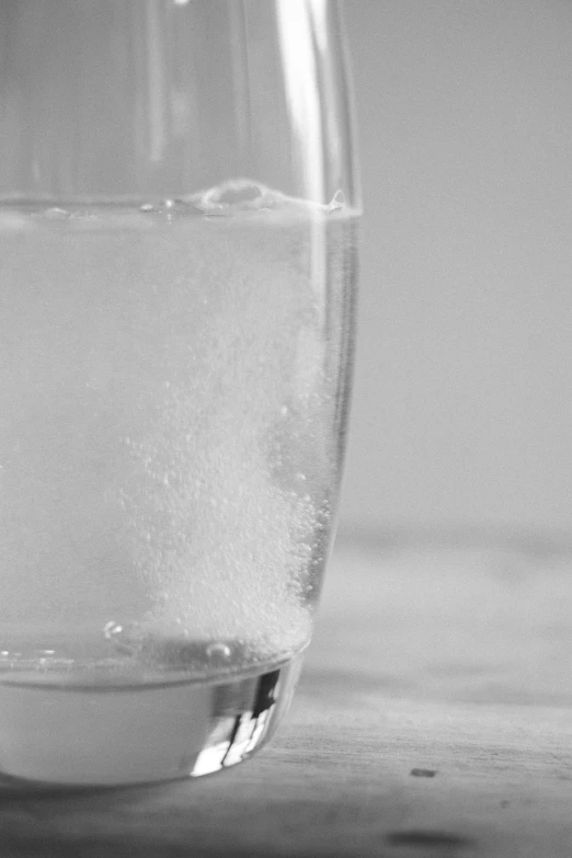 black and white image of a glass filled with water