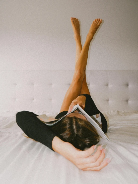 the feet of a women lying down on her stomach