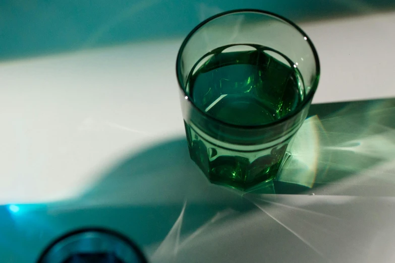 a close up of a glass with water