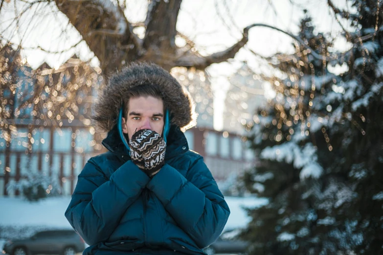 there is a man with a cold mask in the snow