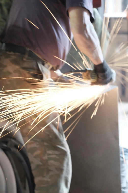 welder  silver foil with sparks on table