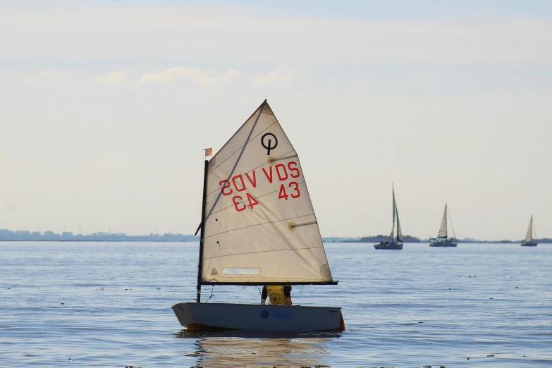 an old style sailboat in the water