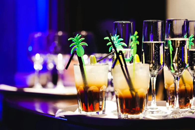 a tray holding many different kinds of drinks