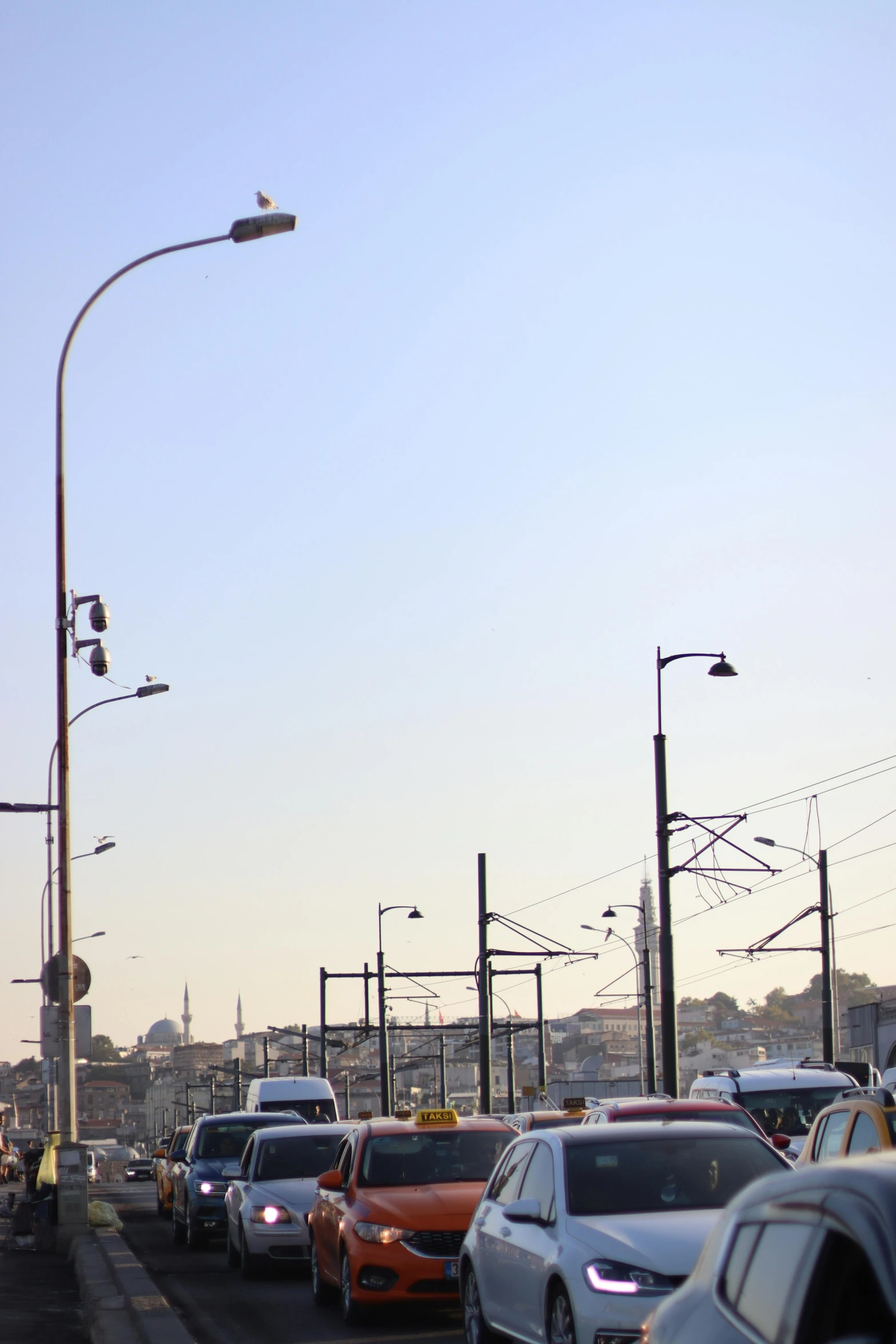 an intersection with many cars at dusk or night