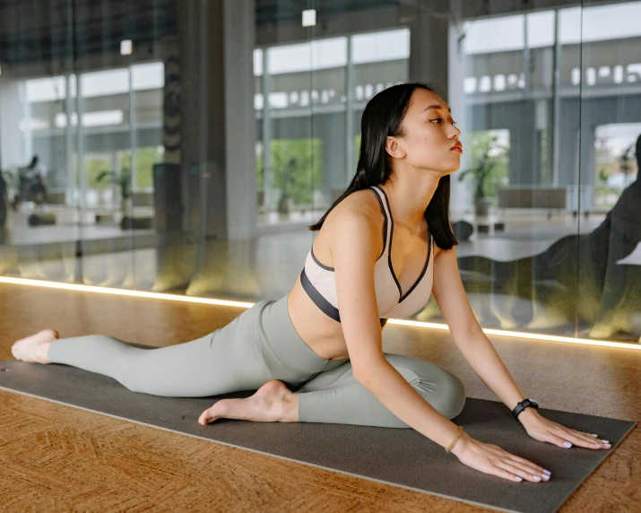 woman in a yoga pose with legs crossed