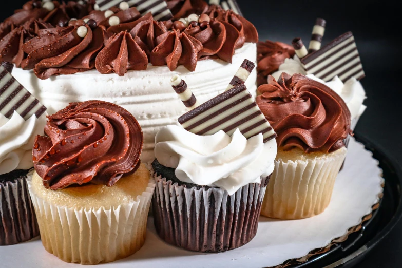 close up of an assortment of cupcakes on display