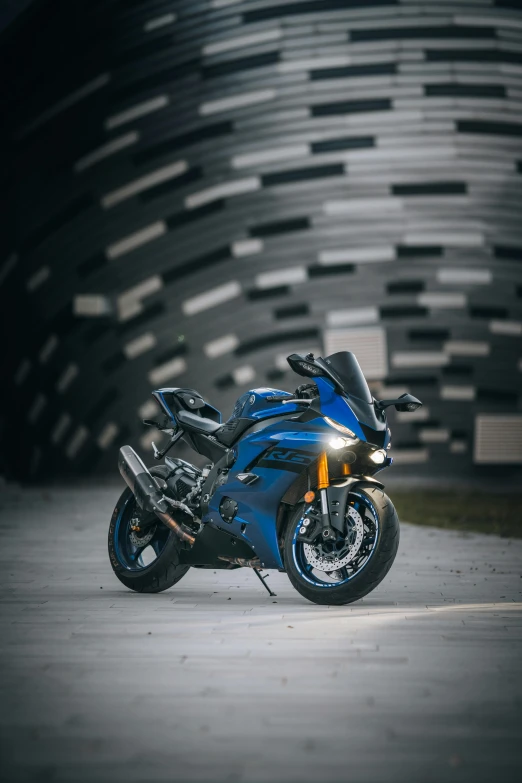 this is a motorcycle parked in front of a large building