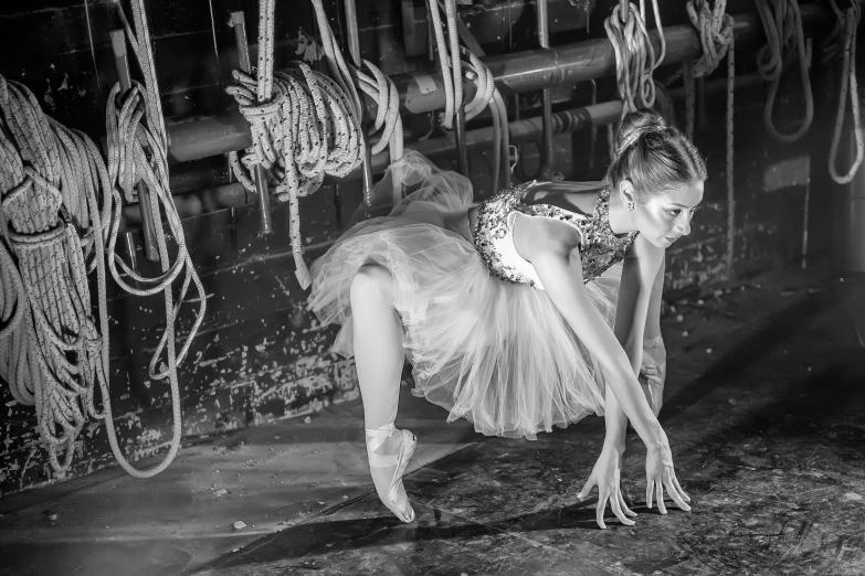 a woman in a costume crouches while reaching down