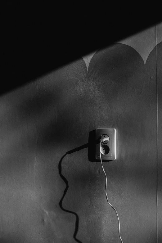 a telephone cord is shown in front of the door