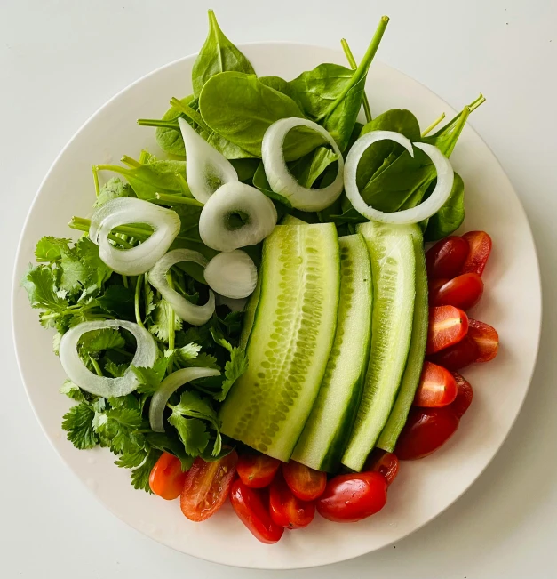 a plate that has some vegetables in it