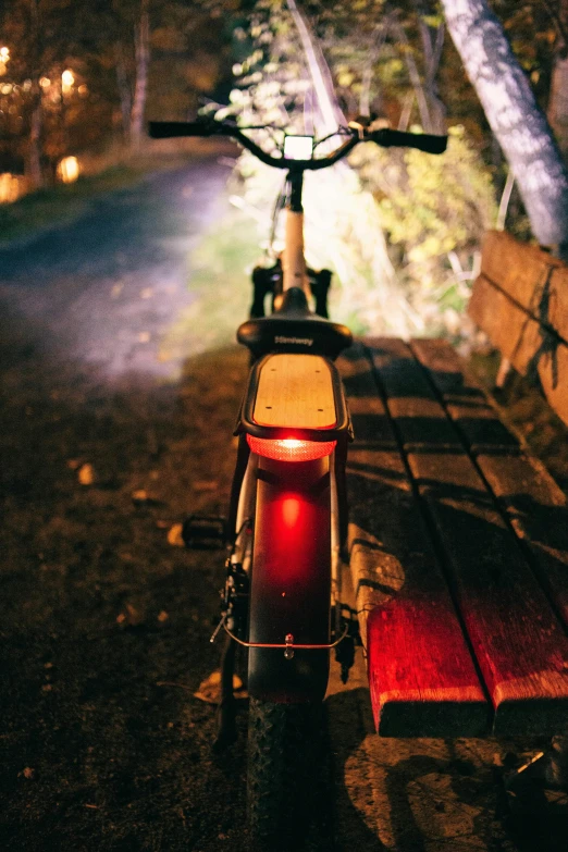 a bike sits on top of a bench