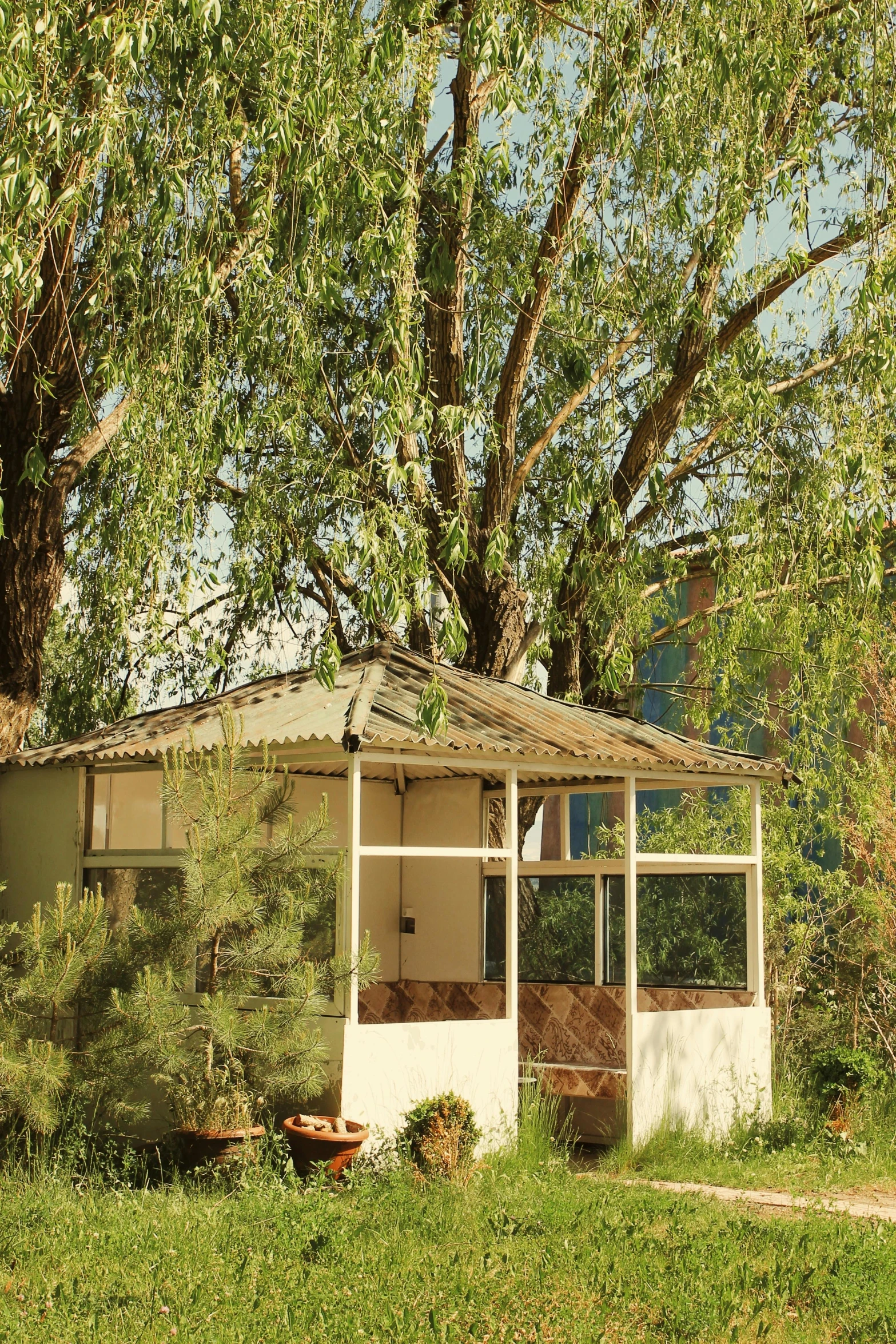 there is a covered in porch on the corner