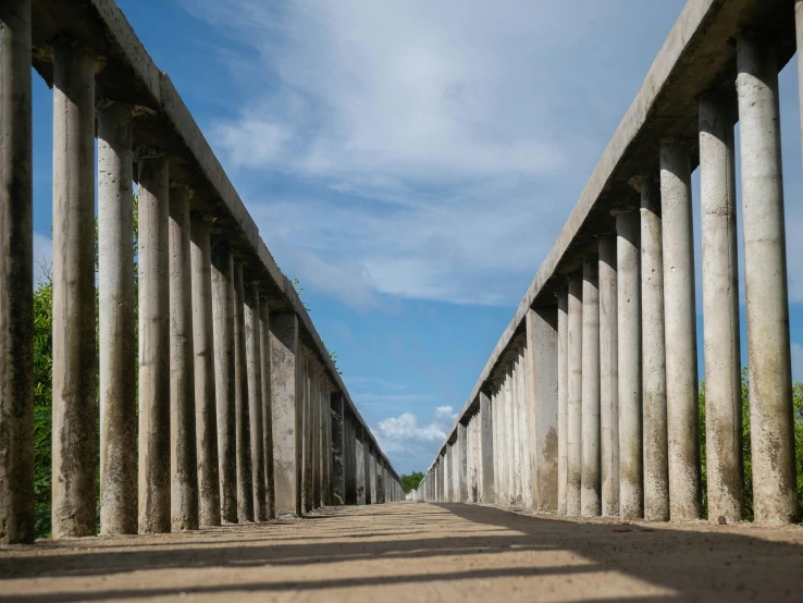 row of pillars lined up along a street