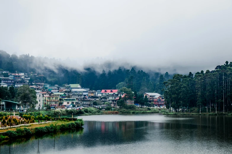 a large body of water sitting on the side of a mountain