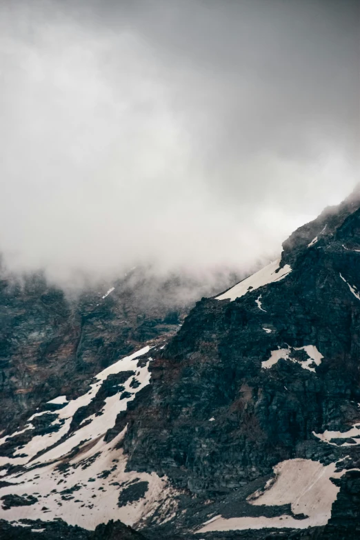 a mountain that has some snow on it