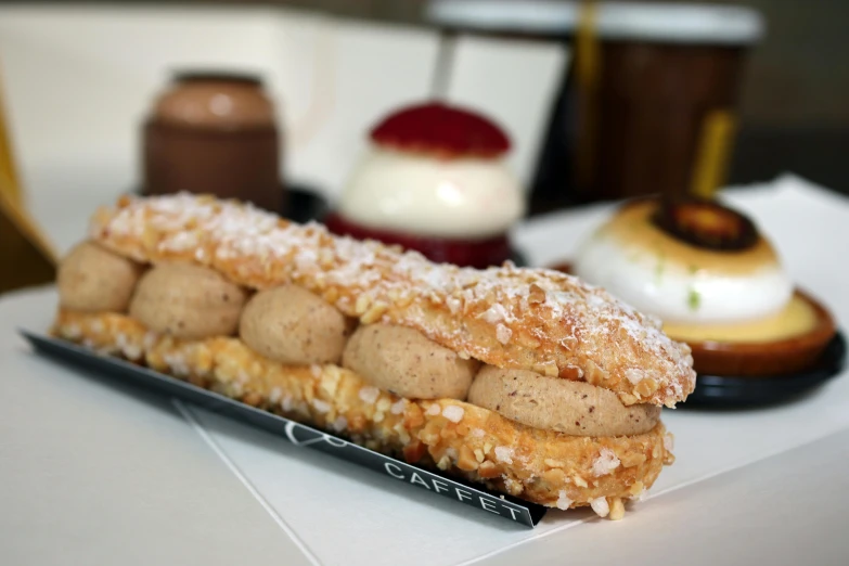 pastry items sitting on a tray next to each other