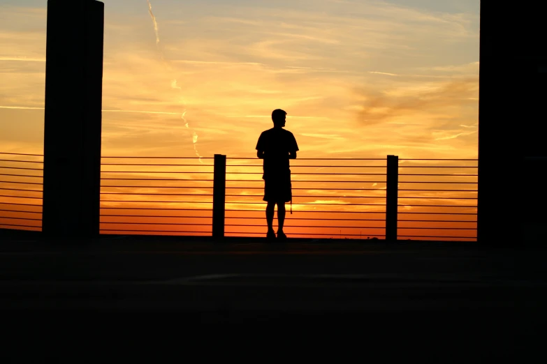 a man that is standing in the street